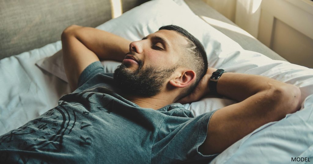 Man sleeping soundly after sleep apnea treatment
